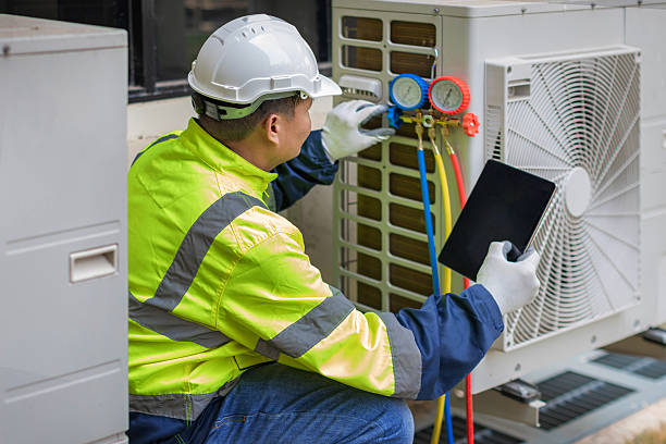 Professional Hvac technician working in Devens, MA